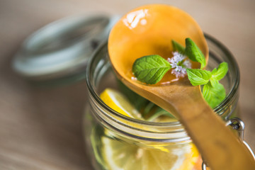 Drink of mint, honey, lemon, lemon balm and grapefruit.