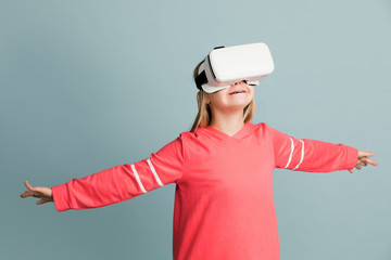 Little girl experiencing a VR headset