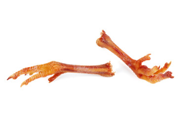 Pair of cured chicken feets isolated on white background