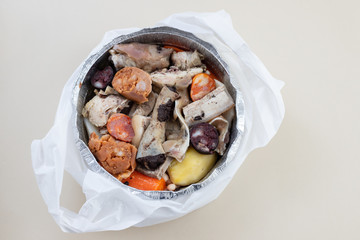 typical portuguese dish cozido a portuguesa in plastic box take away