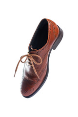 Brown leather shoes in perspective and isolated on white