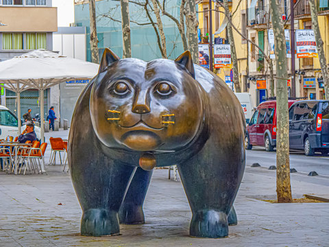 Close-up and front profil of the cat statue El Gato de Botero with moustache hair at Rambla de Raval Square in Barcelona, Spain