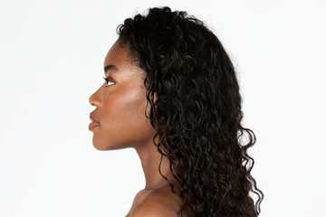 Beautiful black woman in a profile shot - Powered by Adobe