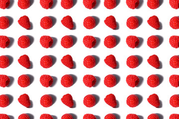 Pattern made of fresh raspberry isolated on white.