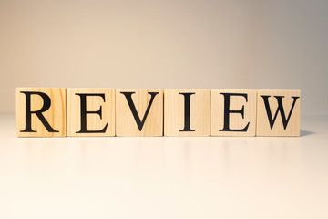 The word review from wooden cubes. Studio