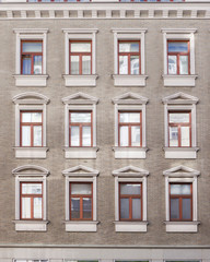 Gray tiles brick facade building front view