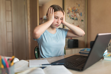 teenager girl is shocked surprised, bad test lesson, home electronic education, laptop video...