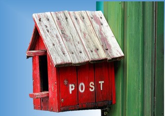 a red mailbox in blue background