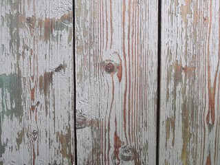 Old plank surface with peeling paint. Abstract background. Flat lay. Copy space.