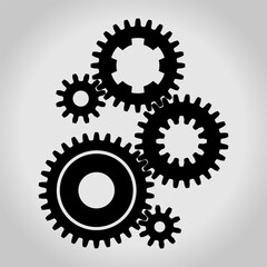 Silhouette of a mechanical gears & cogwheel set, large and small sprockets 5 pieces. Vector illustration.