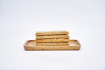 Homemade sesame cookies against a white background during the pandemic
