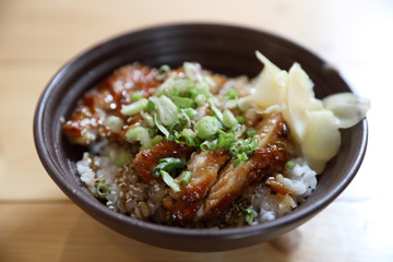 japanese food , Chicken teriyoki with rice on wood background