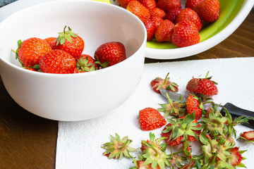Fresh strawberries are cleaned and cut