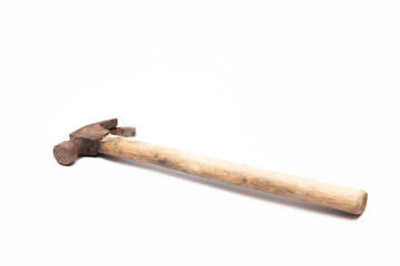 old rusty and dirty wooden handle hammer isolated on white background.