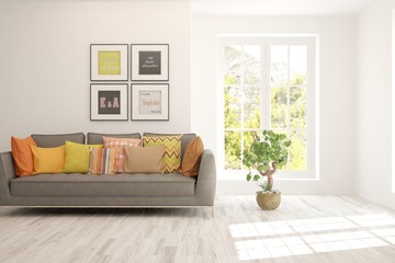 White living room with sofa and summer landscape in window. Scandinavian interior design. 3D illustration