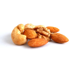 Set of nuts on a white background. Walnuts, almonds, cashews