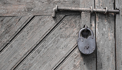 old lock on wooden door