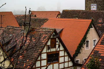 View from town wall of facades and roofs of medieval old town Rothenburg ob der Tauber, Bavaria, Germany. November 2014