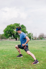 Athlete does warm-up before running at stadium