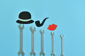 Inscription Fathers Day with different tools and mustache on blue background.Happy father's day...