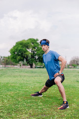 Athlete does warm-up before running at stadium