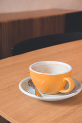 cup of coffee on the wooden table espresso