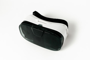 Original black stereoscopic 3d vr mask with headphones, with controller. Isolated on white...
