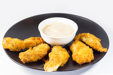 Chicken nuggets on the table, studio shot and white background
