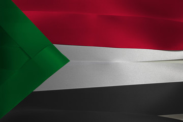 Colorful ribbon as Sudan national flag, red white and black with a green triangle at the hoist.
