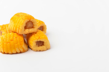Pineapple roll tart cookies known as Tat Nenas isolated on white background. Modern cookies for Hari Raya Aidilfitri (Eid UI-Fitr) celebration. Pineapple tart isolated.