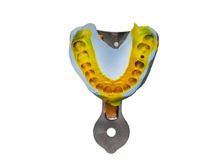 dental spatula with print for dental implant . dental spatula with an impression for the dental crown isoleted on white background.