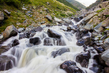 Obraz na płótnie Canvas Waterfall in the Mountains