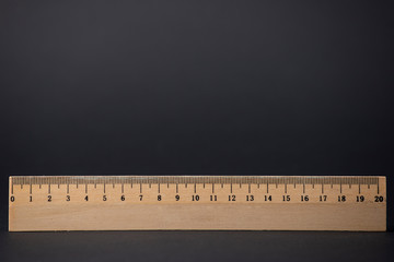 Wooden Ruler on a black background