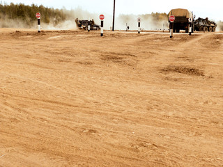 Battle tanks and cars on a battle line. The border.