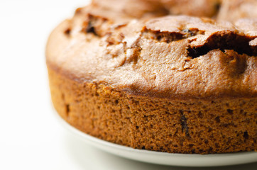 Freshly made spiced fruit ring loaf cake  on the white  background