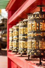 Buddhistic prayer wheel in Ivolginsky Datsan, near Ulan-ude, Mongolian prayer wheel, epigraph:...