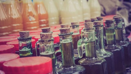 Green glass bottle with cork on top 