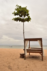 Paradise on the island. The canopy on the beach in Bali  Nusa Dua. Indonesia. © PPphoto