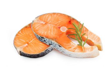 Raw salmon slices with rosemary on white background. Clipping path.