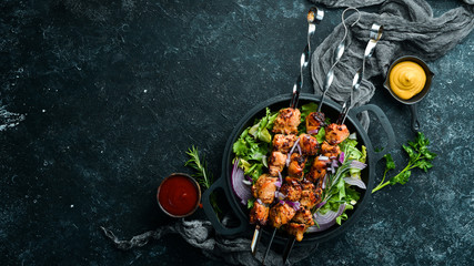 Juicy chicken skewers with rosemary and spices. Top view. Barbecue.