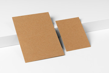 Empty craft business cards on white background.