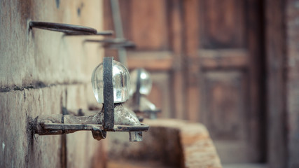 Rusty Water Tap With Shiny Metal On Pipe Head