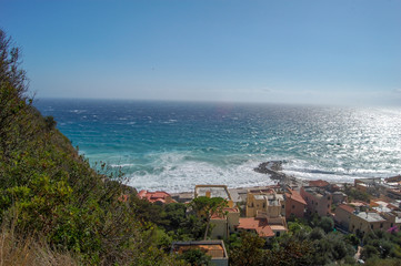 Fototapeta na wymiar aerial view of mediterranean town and coastline at the sea in Varigotti, Liguria, Italy