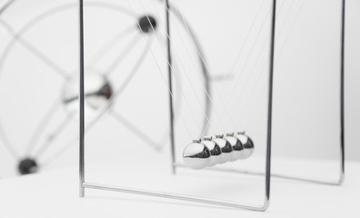 balancing balls on a white background. business concept. Newtons Cradle