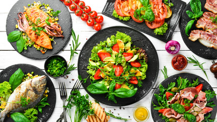 Food. Set of dishes on the white table. Food background. Top view. Free copy space.