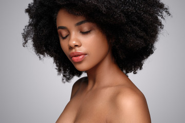 Attractive black lady with closed eyes