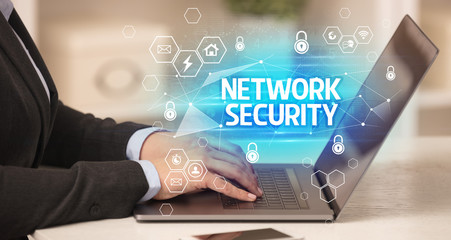 NETWORK SECURITY inscription on laptop, internet security and data protection concept, blockchain and cybersecurity