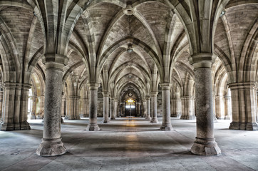 Ancient Cloisters - exterior public walkway covered with vaulted stone roof - obrazy, fototapety, plakaty