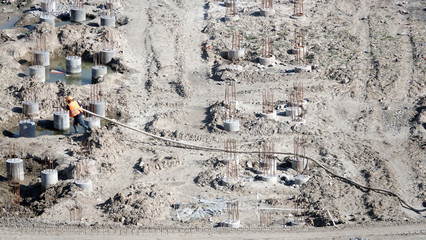 Workers - zero-cycle construction of the foundation of an entertainment center