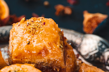 Turkish arabic desserts on silver plate close up